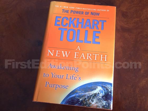 Picture of the 2005 first edition dust jacket for A New Earth. 