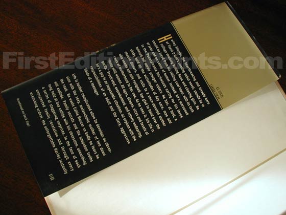 Picture of dust jacket where original $24.95 price is found for Back Roads. 