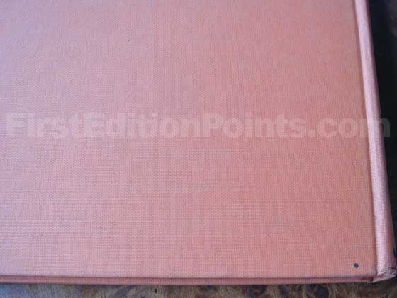 Book club editions have a dot on the lower right of the back boards (near the spine