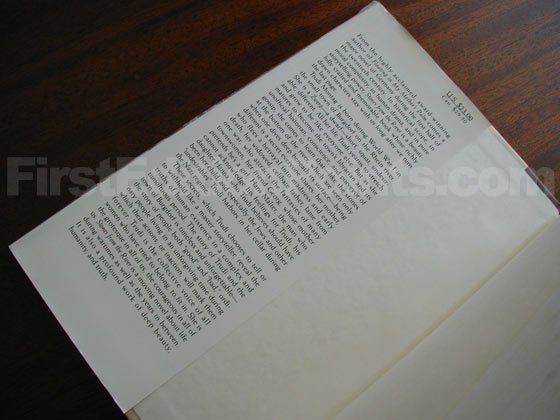 Picture of dust jacket where original $23.00 price is found for Stones from the River. 