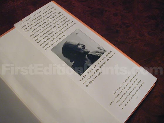 Picture of the back dust jacket flap for the first edition of The Bear Comes Home. 