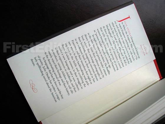 Picture of dust jacket where original $22.00 price is found for The Buddha in the Attic. 