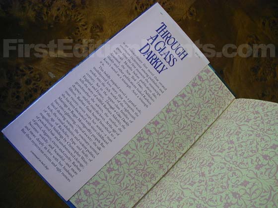 Picture of dust jacket where original $19.95 price is found for Through a Glass Darkly. 